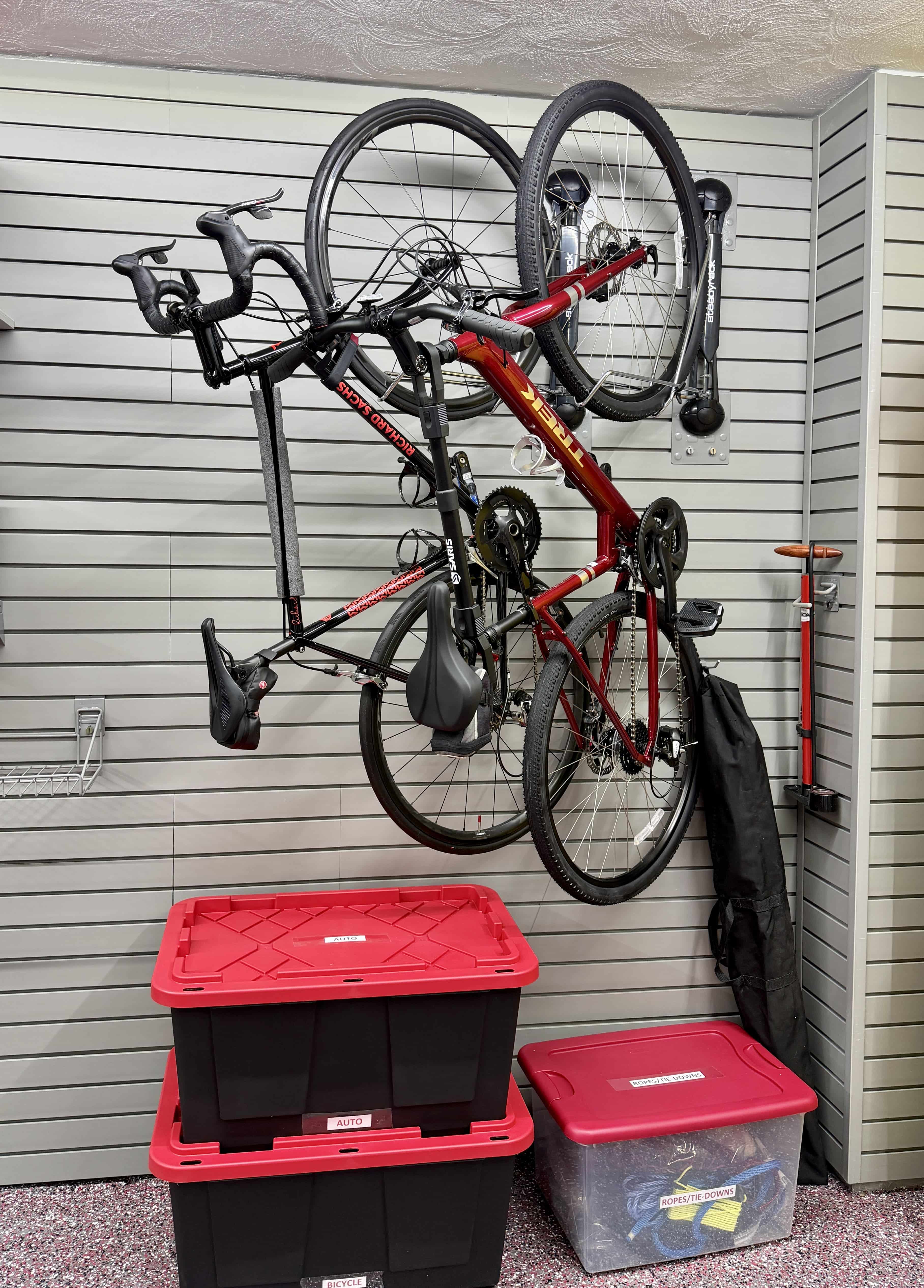 Day 5. Bike racks are installed and swing out for easy loading and storage. Bikes stay off the floor and out of the way. No more leaning bikes or tangled wheels; each bike has its own spot.