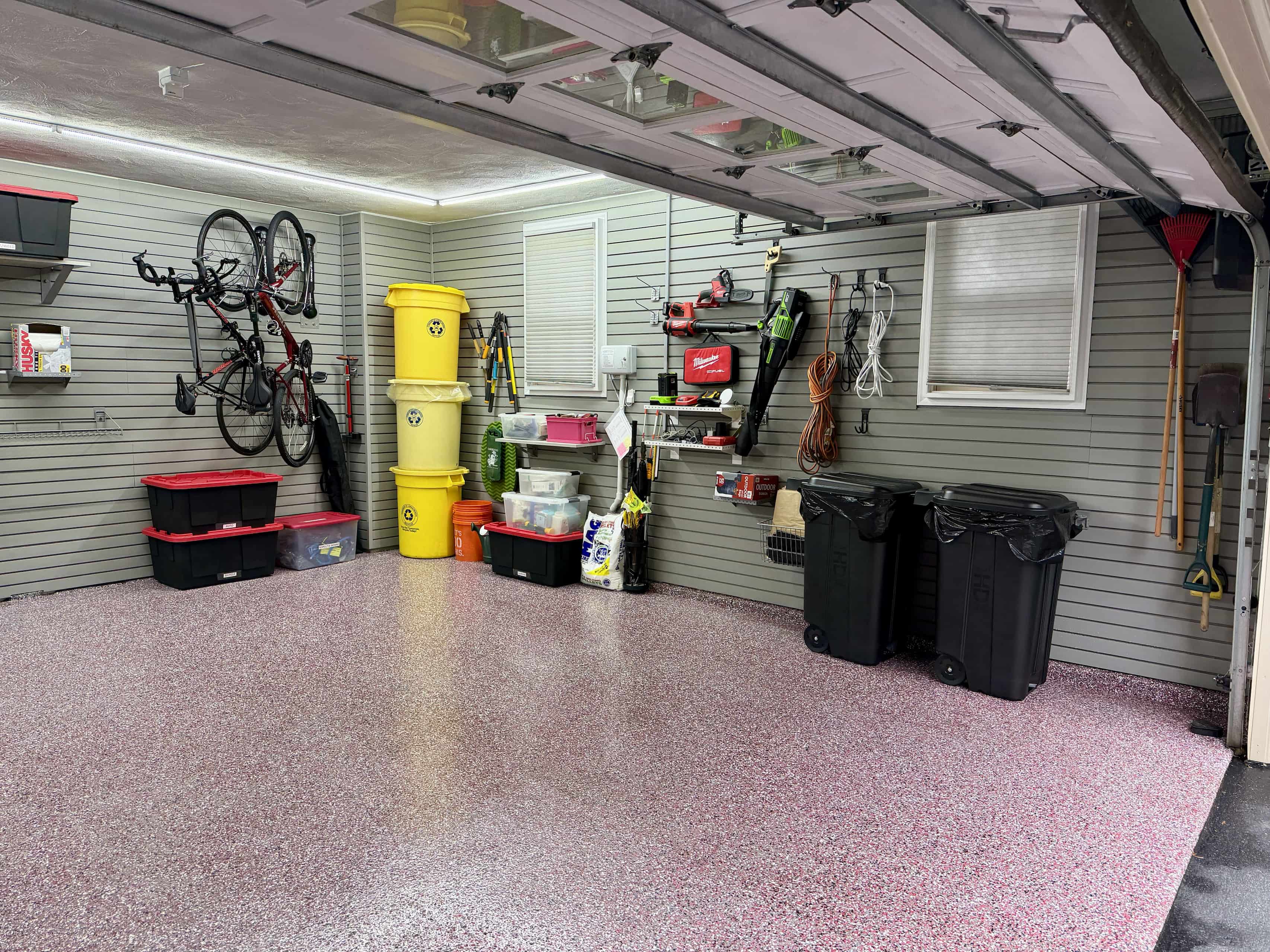 Tools are going up on the walls. We are almost there. Your garage is taking its final form. Wall mounted tool holders keep everything visible and within reach instead of buried in drawers.